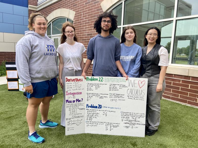 Cape High students (l-r) Sarah Naar, Madeline McGlothan, Ali Ahmed, Victoria Lingo, and Hnin Khine share their projects at the annual math fair May 19. ELLEN DRISCOLL PHOTOS
